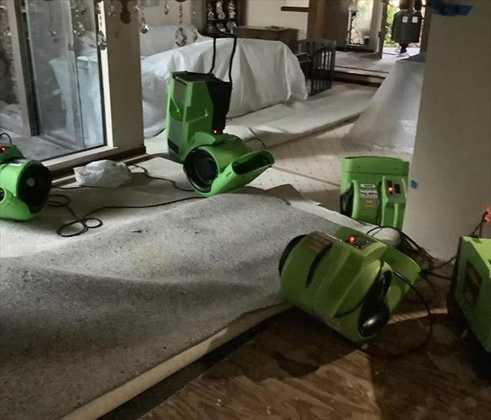 Air Movers facing a ceiling